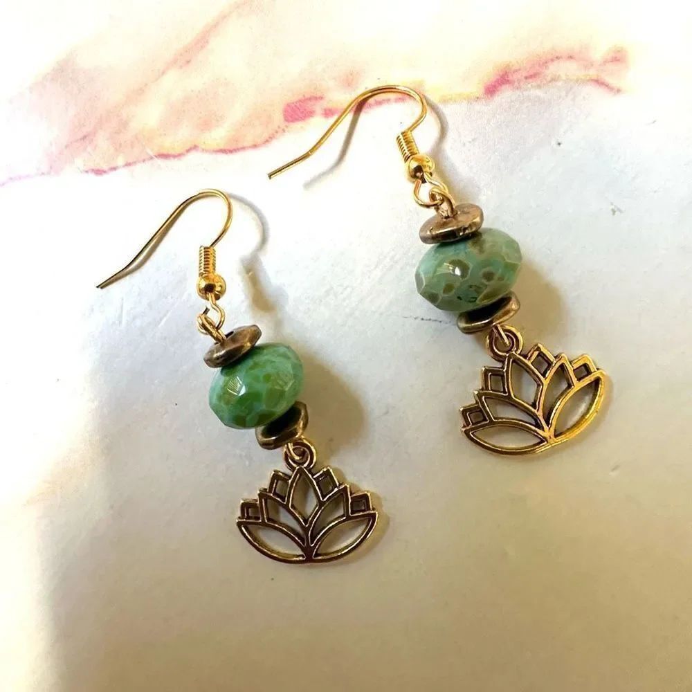 Gold tone green lotus drop earrings